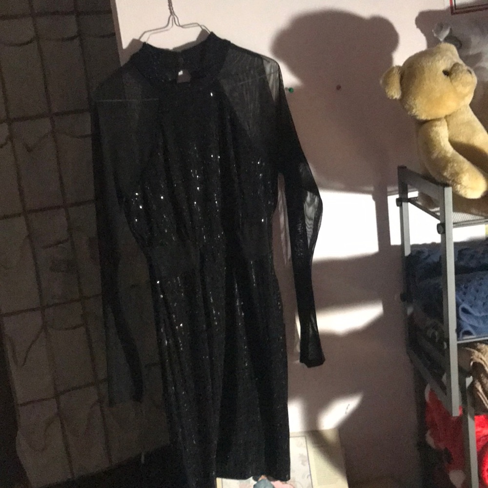 Beautiful, black sequined dress.